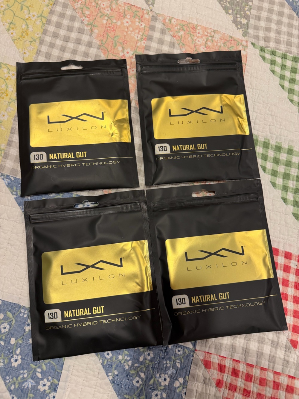 Luxilon Natural Gut 16 gauge tennis racquet string / set of 4